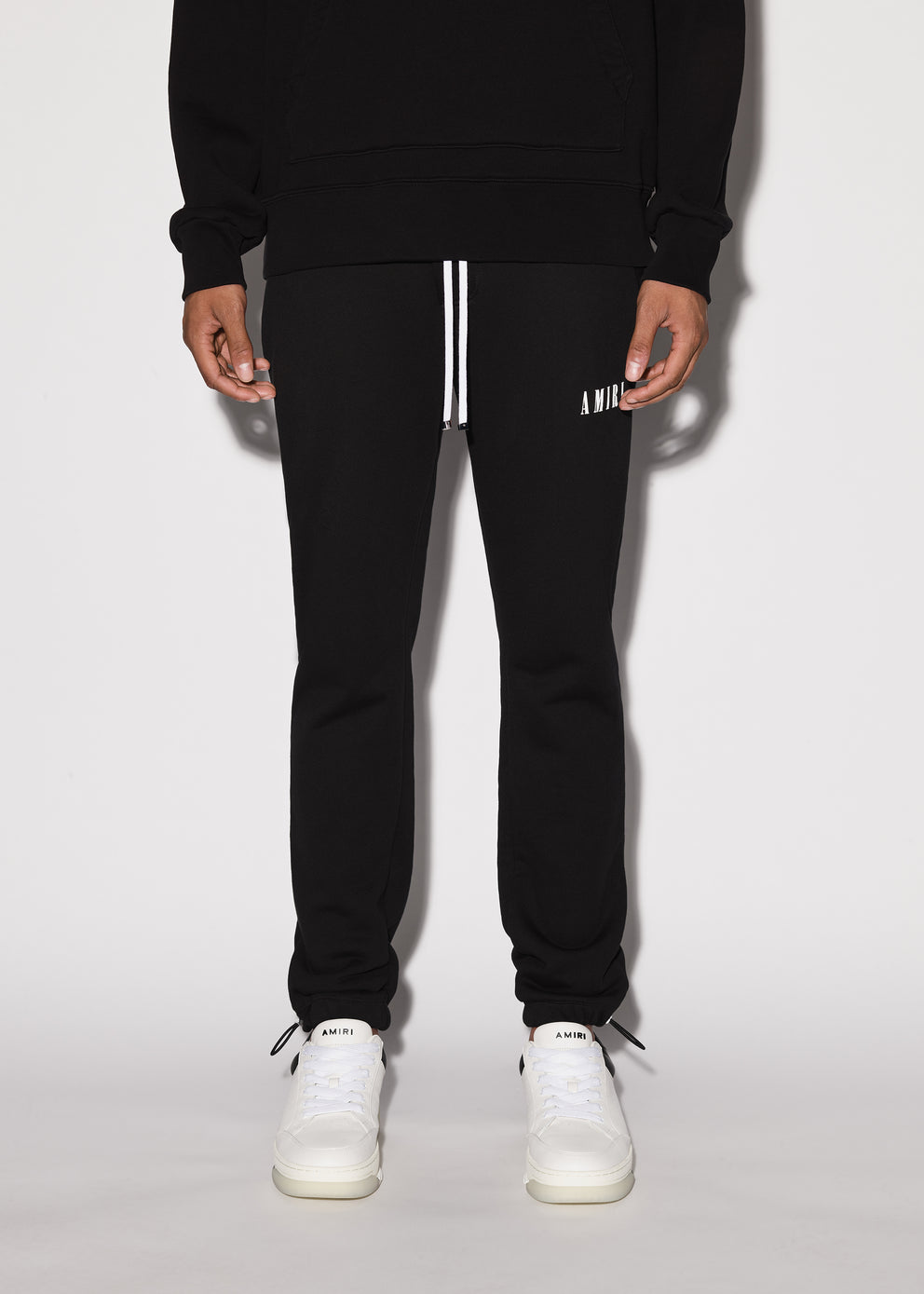 Black Amiri CORE LOGO SWEATPANTS | 418375-GMH