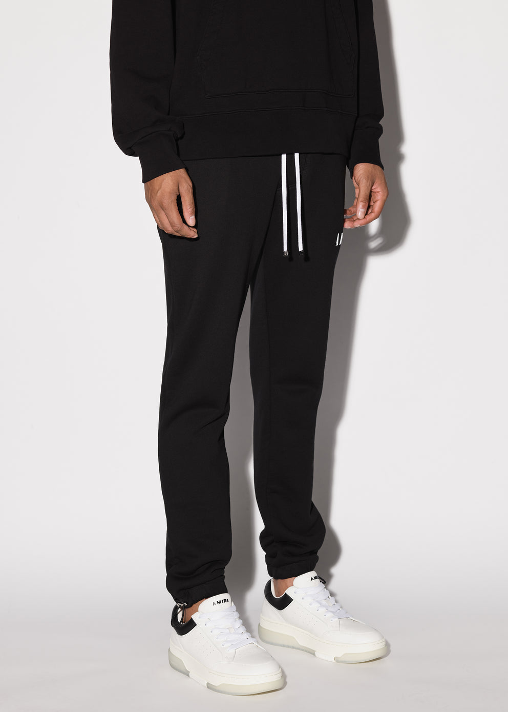 Black Amiri CORE LOGO SWEATPANTS | 418375-GMH