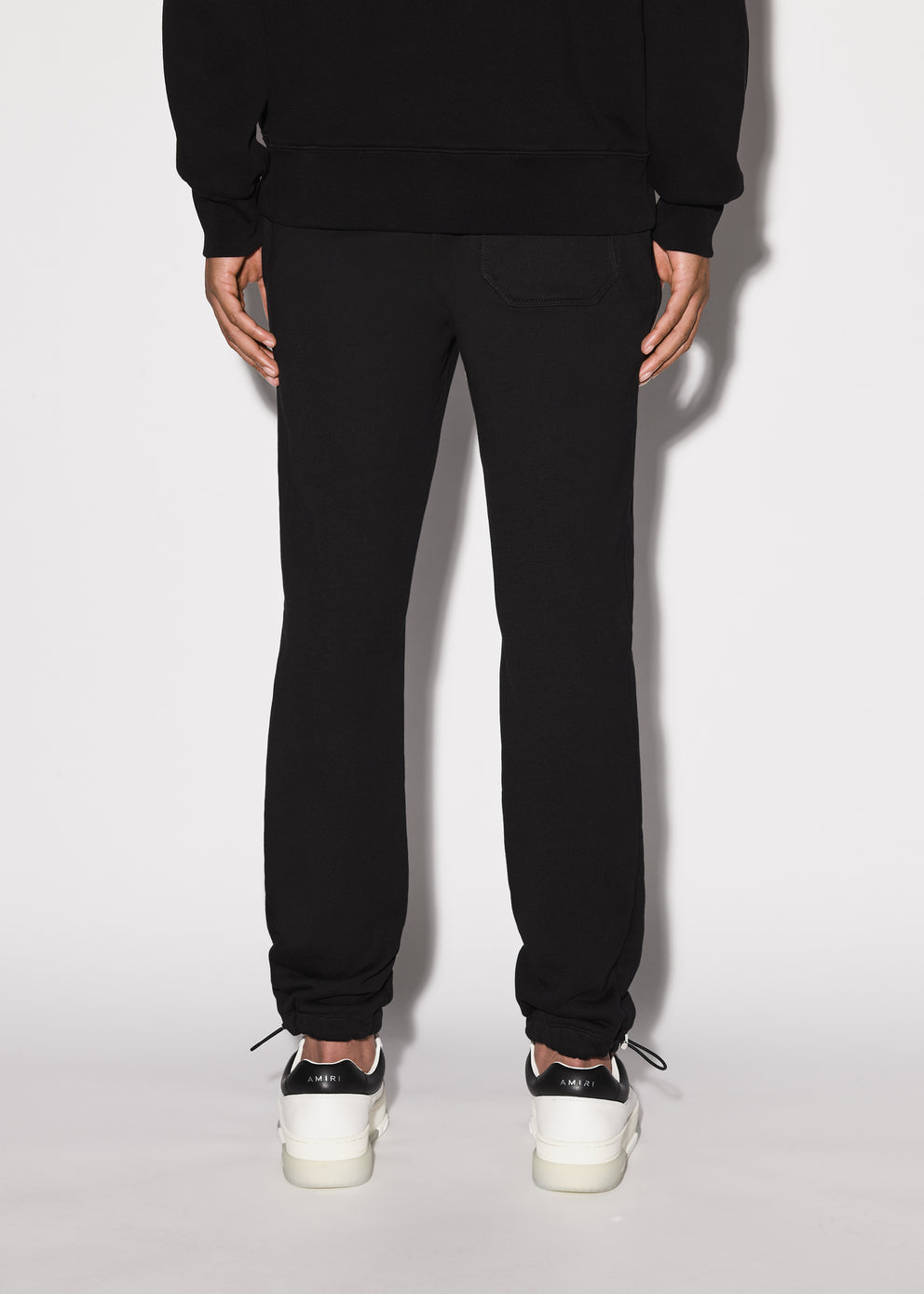 Black Amiri CORE LOGO SWEATPANTS | 418375-GMH