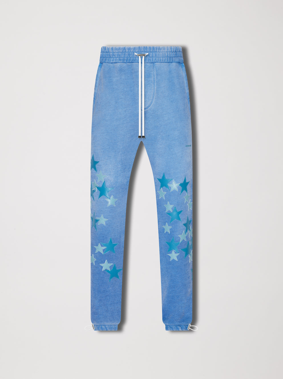 Heather Carolina Blue Amiri PIGMENT SPRAY STAR SWEATPANTS | 354879-WKF